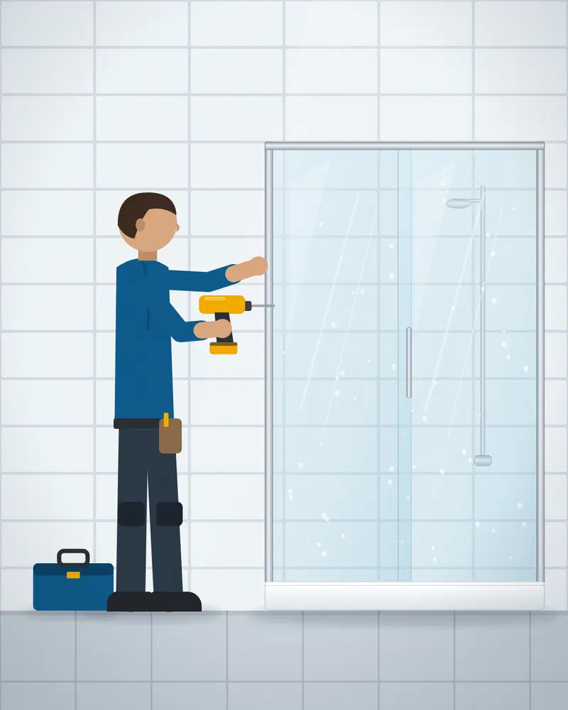 Rafał fitting a shower enclosure in a Poznań bathroom